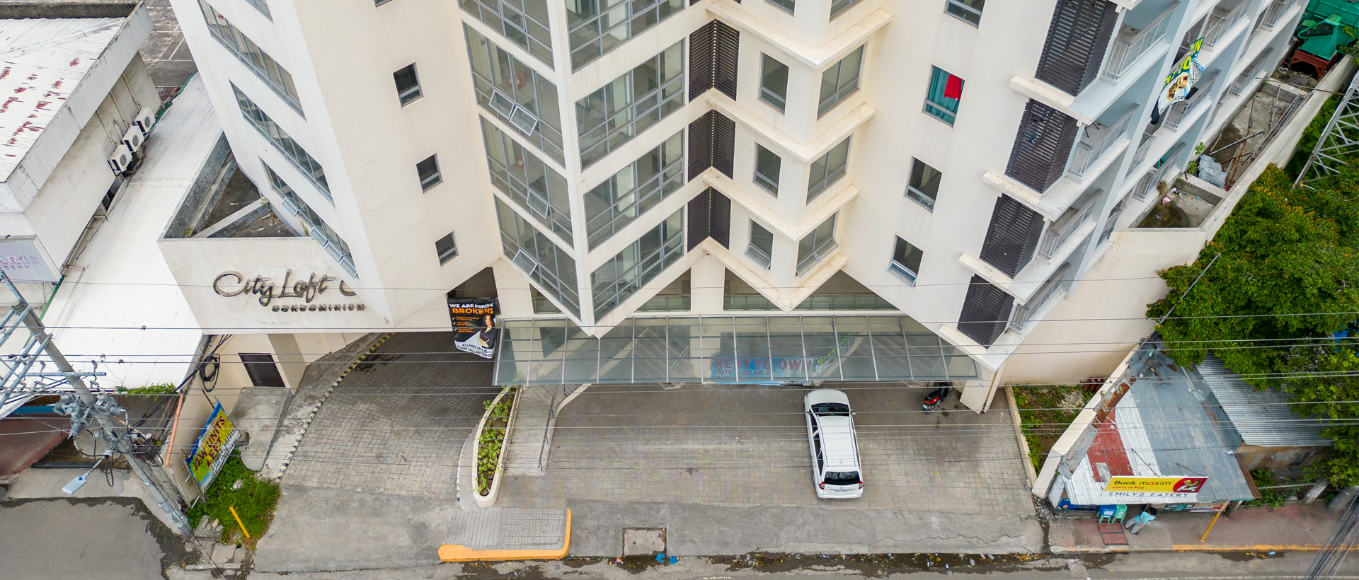 Exterior view of a modern city loft building in an urban setting