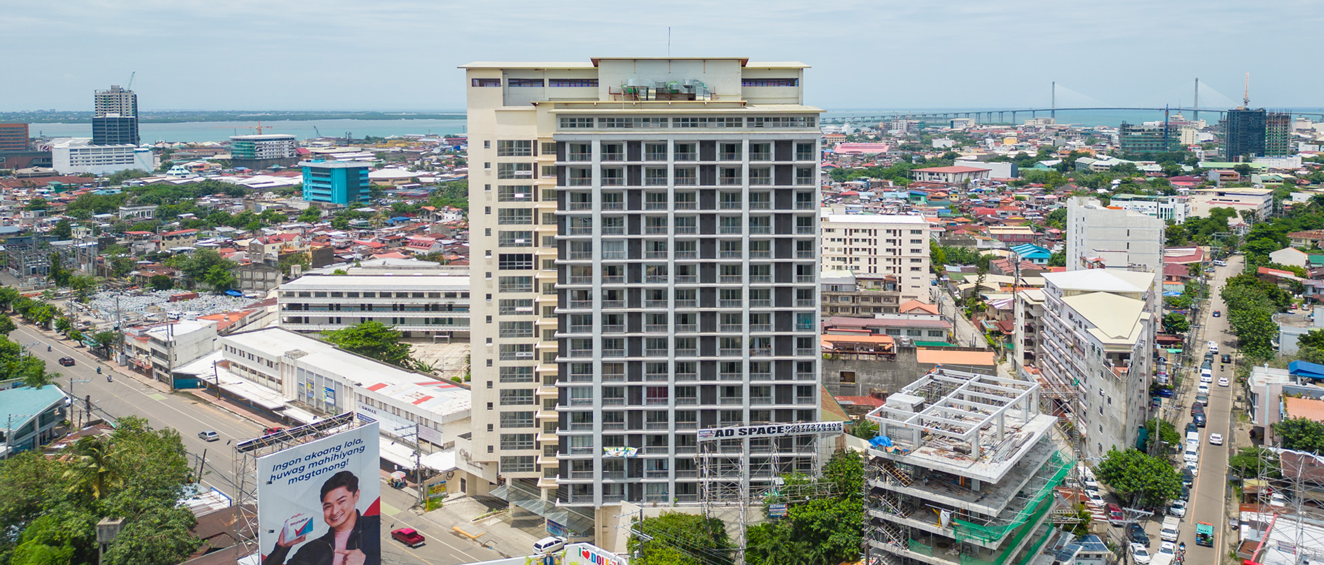 Exterior view of a modern city loft building in an urban setting