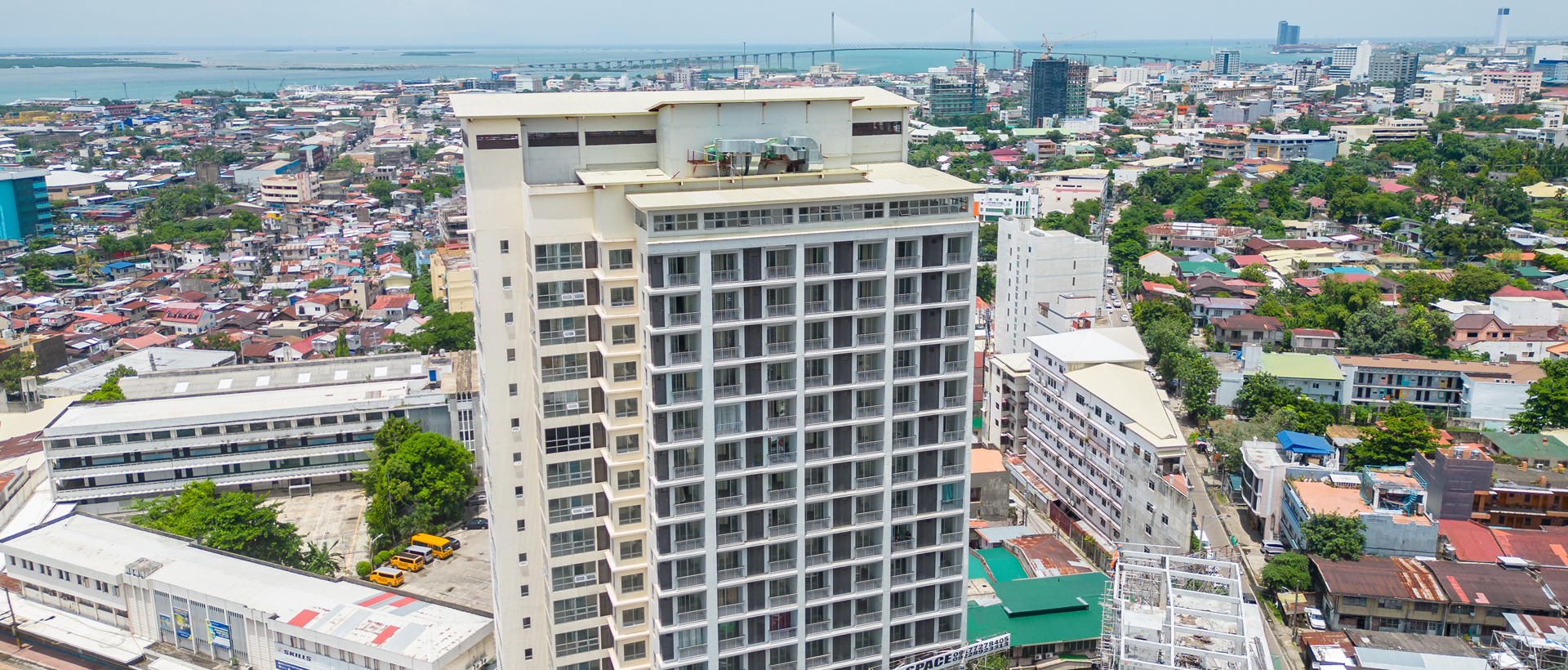 Exterior view of a modern city loft building in an urban setting