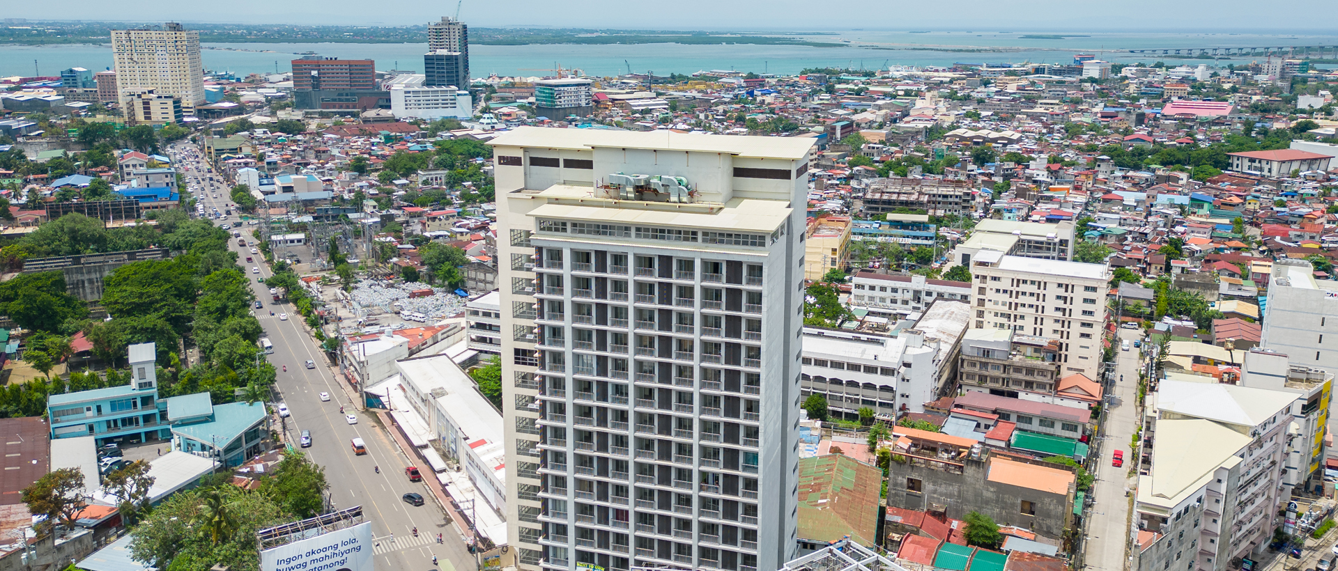 Exterior view of a modern city loft building in an urban setting