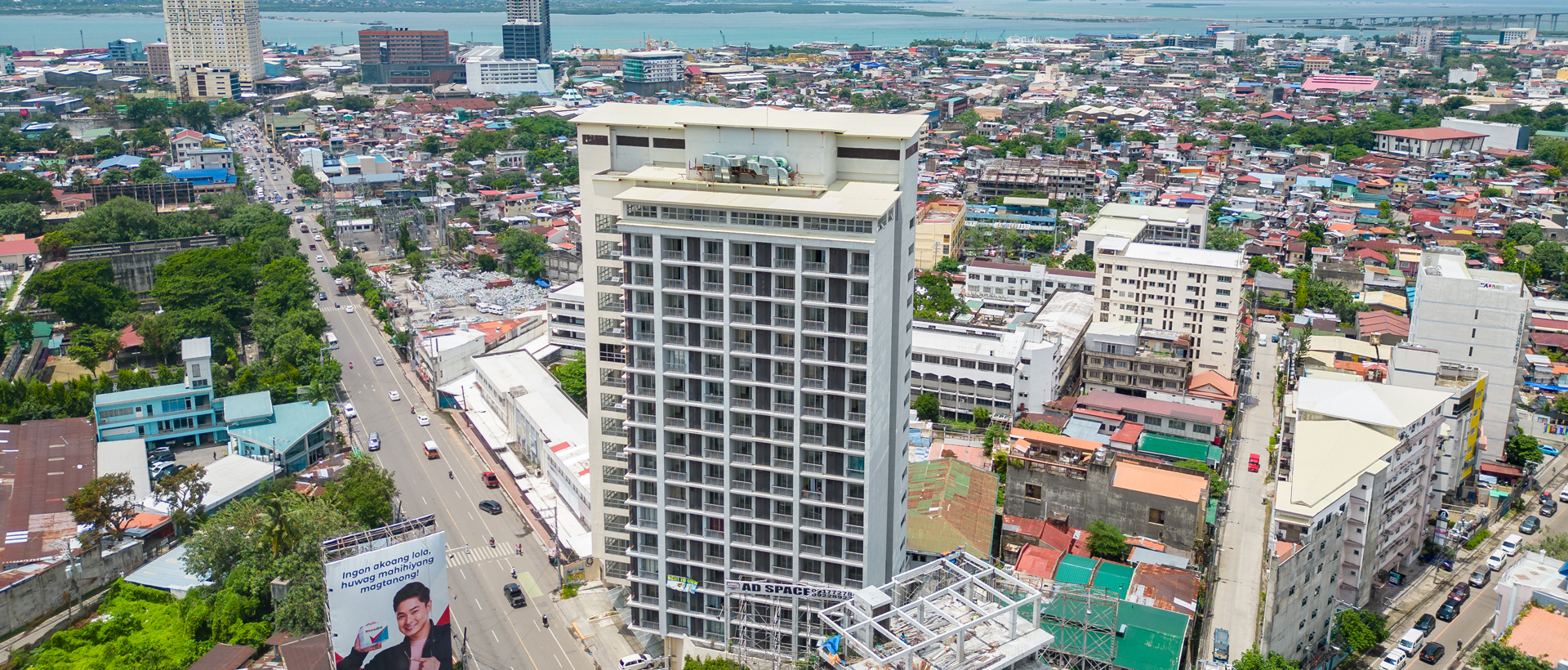 Exterior view of a modern city loft building in an urban setting